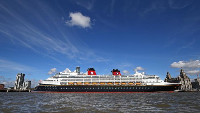 disney cruise line in front of the liverpool waterfront as cruises return